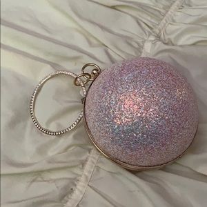 Glitter ball clutch bag with ring handle